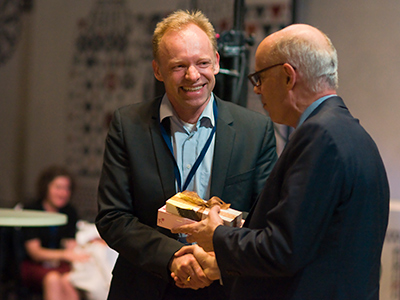 Leaving President Joel Slemrod and incoming President Clemens Fuest (at Conference Dinner)