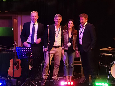 Clemens Fuest, Scientific Organizers Daniel Waldenström and Bas Jacobs with IIPF Young Economists Award Winner Mathilde Muñoz